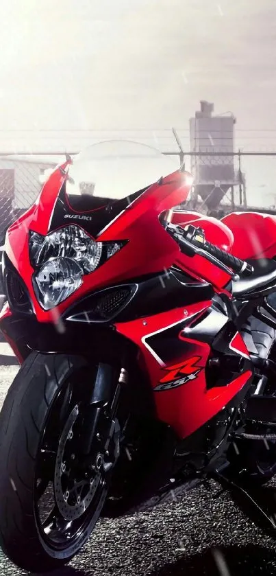 Red sport motorcycle with urban city background.