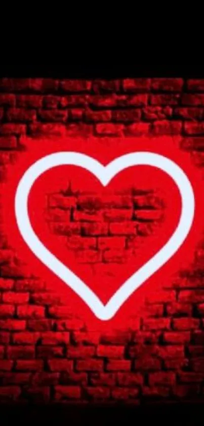 Red neon heart on a brick wall wallpaper.