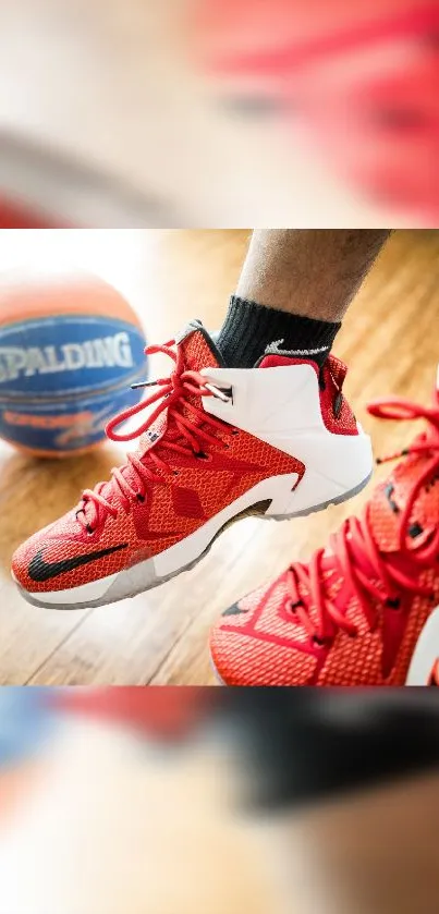 Red sneakers on basketball court with a Spalding ball.