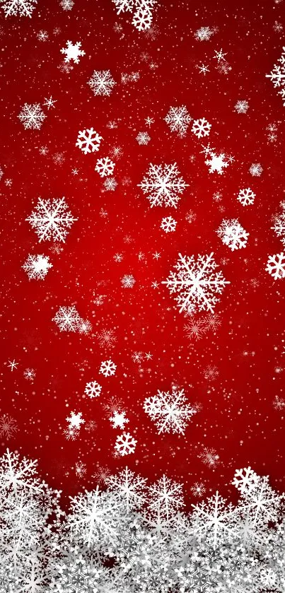 Red mobile wallpaper with white snowflakes.