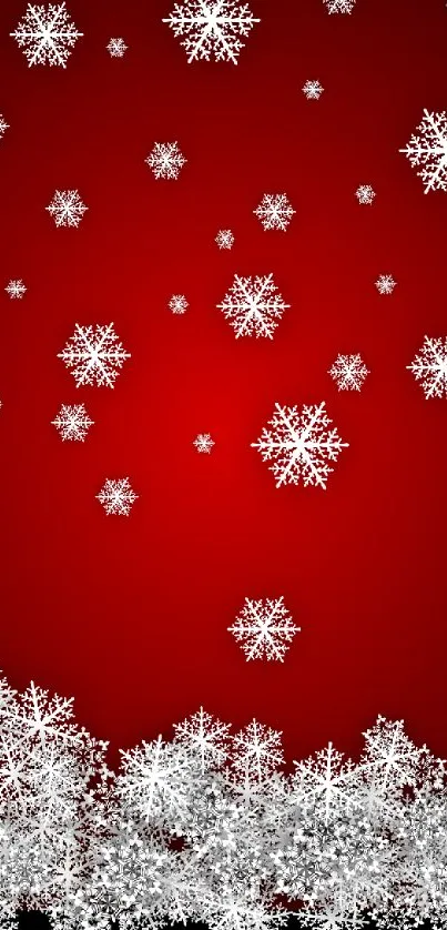 Red mobile wallpaper with delicate white snowflakes.