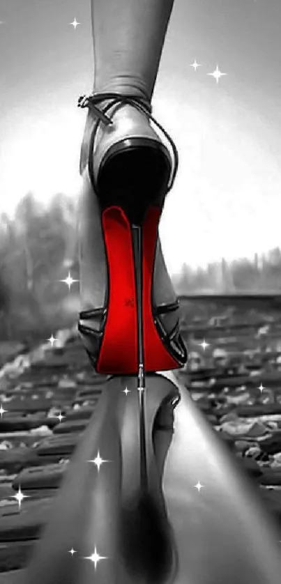 Mobile wallpaper with red-soled heels on a railway track.