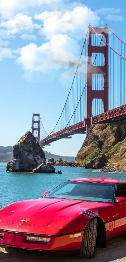 Red sports car parked by Golden Gate Bridge with clear sky.