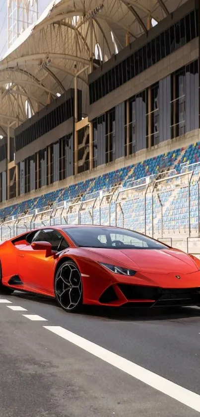 Sleek red sports car on an empty racetrack, ideal for mobile wallpaper.