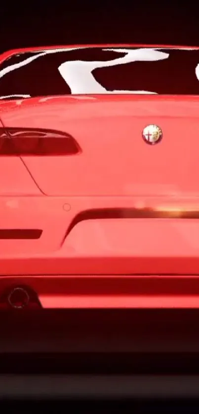 Rear view of a sleek red sports car against a dark background.