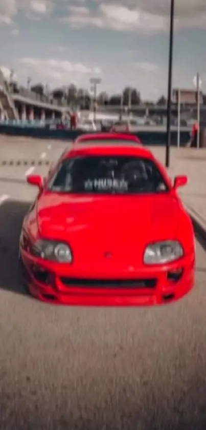 Vibrant red sports car parked in an urban setting.