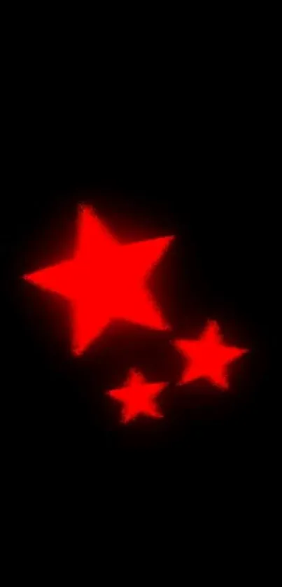 Mobile wallpaper with glowing red stars on a black background.