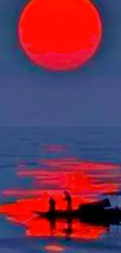 Red sun setting over calm sea with reflection.