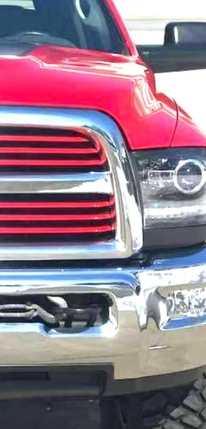 Front view of a red truck with chrome accents, perfect for mobile wallpaper.