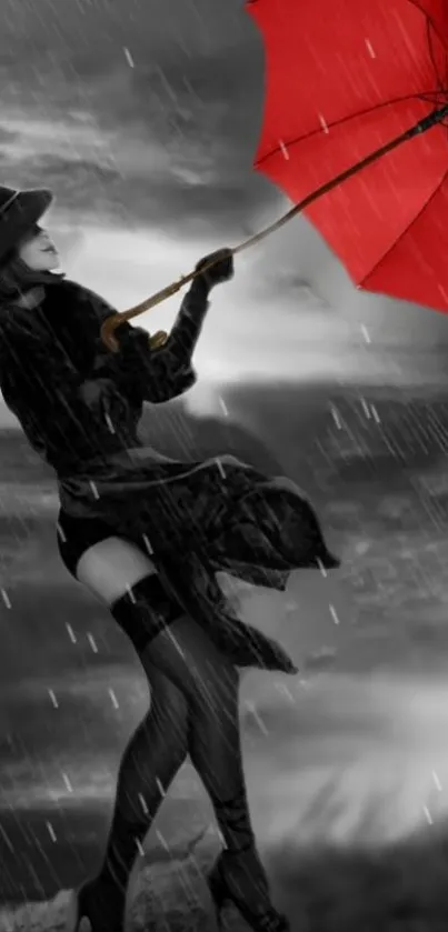 Woman with red umbrella in stylish monochrome rain scene.