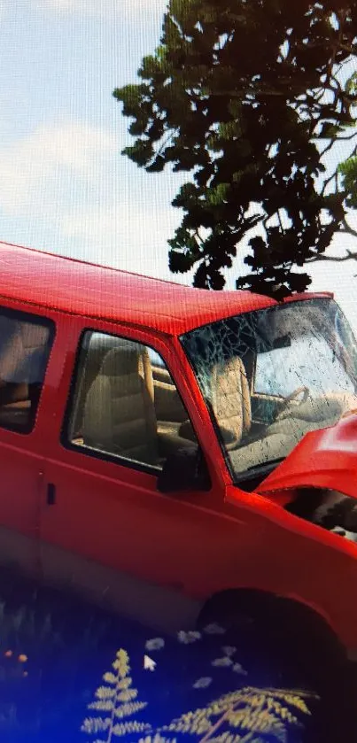 Red van crash into tree with scenic background wallpaper.