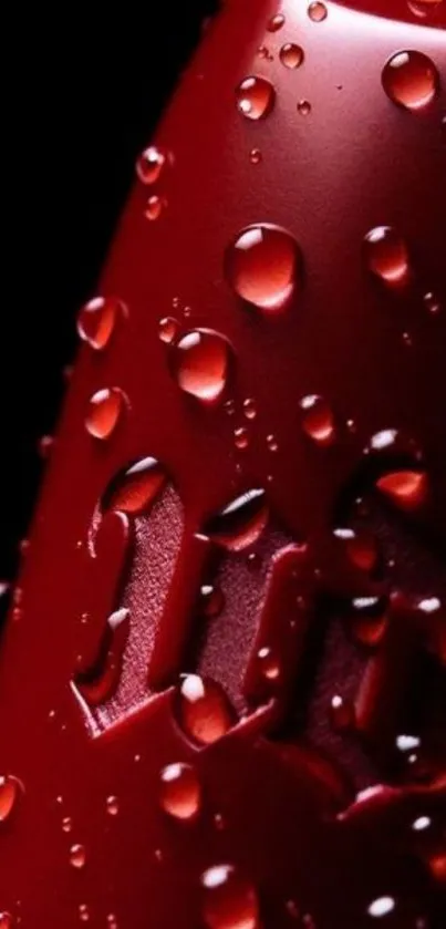 Close-up of red surface with water droplets.