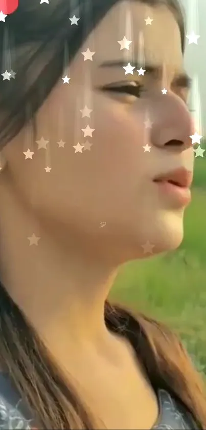 Outdoor portrait with star effects and nature background.