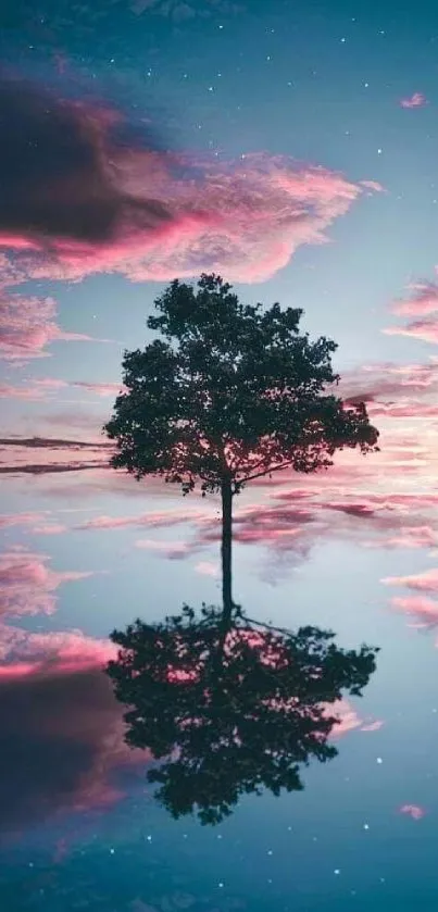 Single tree reflecting in sunset water.