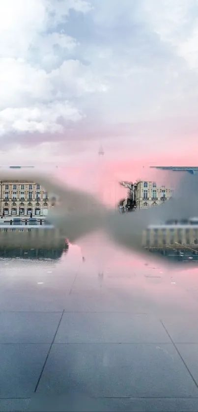 Urban sunset with pink reflection on a calm cityscape background.