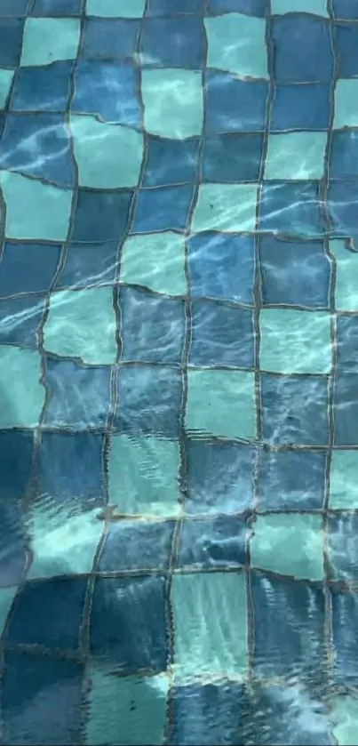 Aqua pool tiles with water reflections creating a soothing pattern.