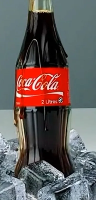 Coca-Cola bottle surrounded by ice cubes.