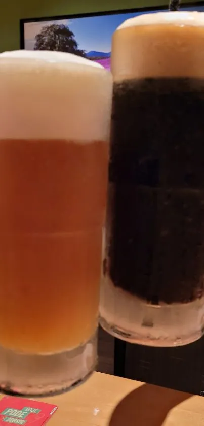 Two frothy beer mugs clinking together on a wooden table.