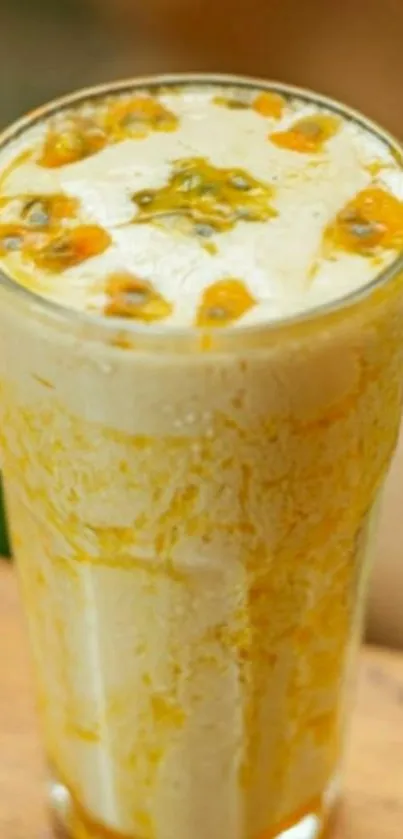 A refreshing passion fruit smoothie in a clear glass.