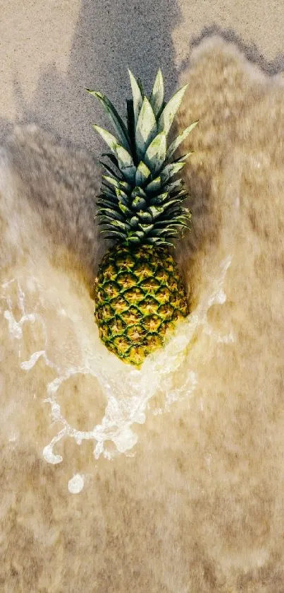 Pineapple on sandy beach with waves.