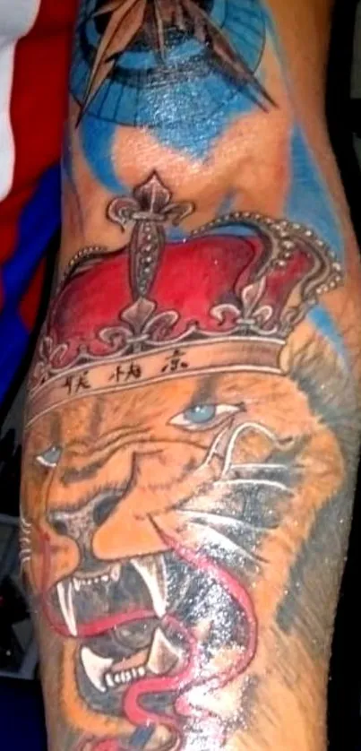 Lion tattoo with crown on arm, vibrant colors