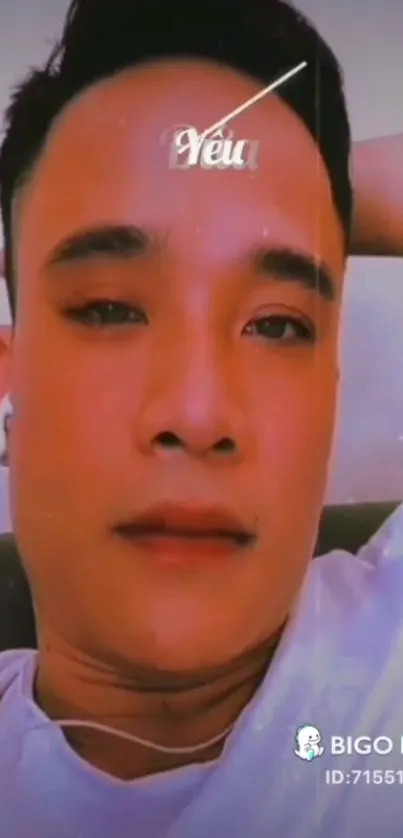 Person relaxing with headphones on, soft hues.