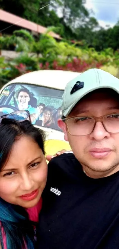 Couple enjoying a selfie in a scenic outdoor setting, ideal for travel lovers.