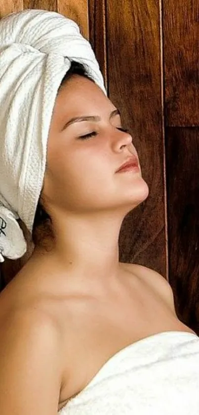 Spa themed wallpaper with woman in towel and wooden background.