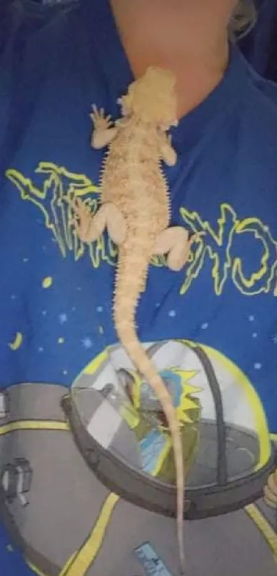 Bearded dragon on blue sci-fi t-shirt.