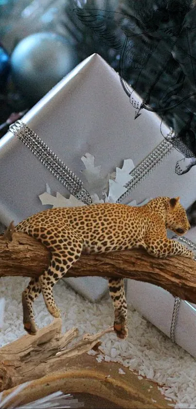 A leopard resting on a branch with silver gift boxes in the background.