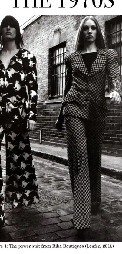 1970s fashion wallpaper in black and white with two women in retro suits.