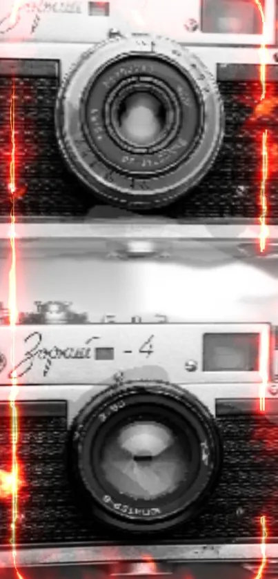 Vintage cameras with vibrant red-orange lighting effect.