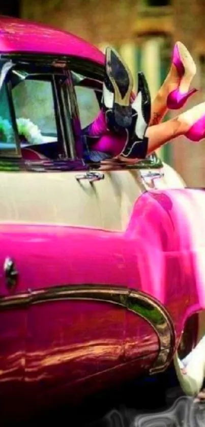 Retro pink car with high heels fashion display.