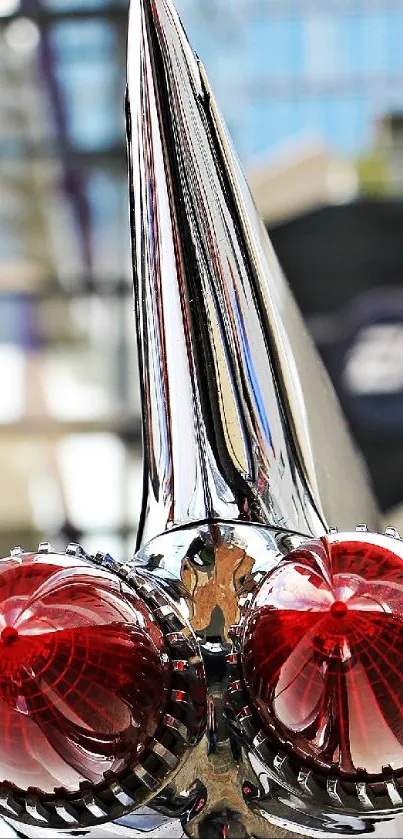 Art Deco chrome design with red elements on mobile wallpaper.