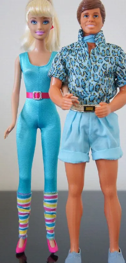 Retro doll couple in vibrant outfits with sky blue tones.