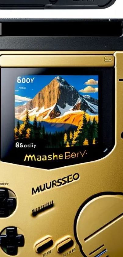 Retro gaming device with mountain scene display on gold interface.