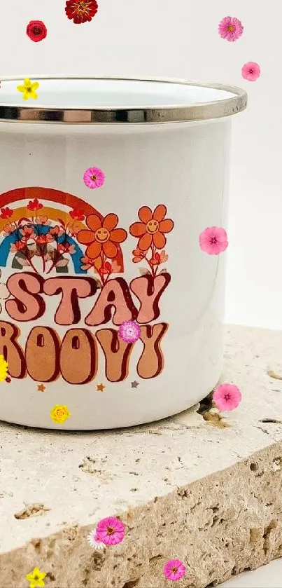 Retro mug with 'Stay Groovy' design on stone slab.