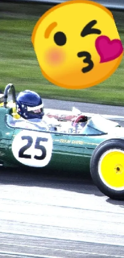 Retro green racing car with yellow wheels and emoji on mobile wallpaper.