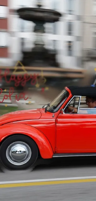 A red vintage convertible speeds on city street with festive message.