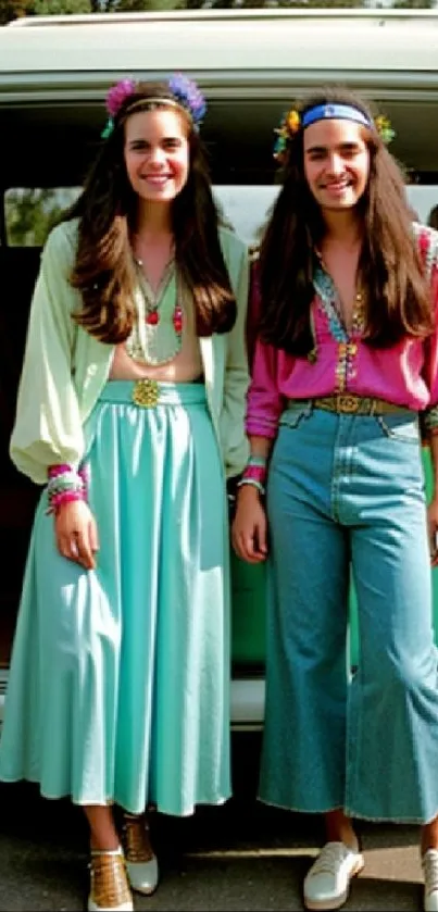 Two women in retro outfits with a vintage van.