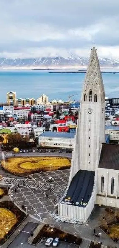 Aerial view of Reykjavik with iconic church and colorful buildings.