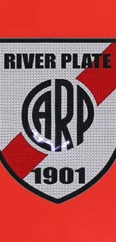 River Plate logo on red background.