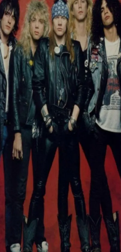 Iconic rock band in leather jackets on red background.