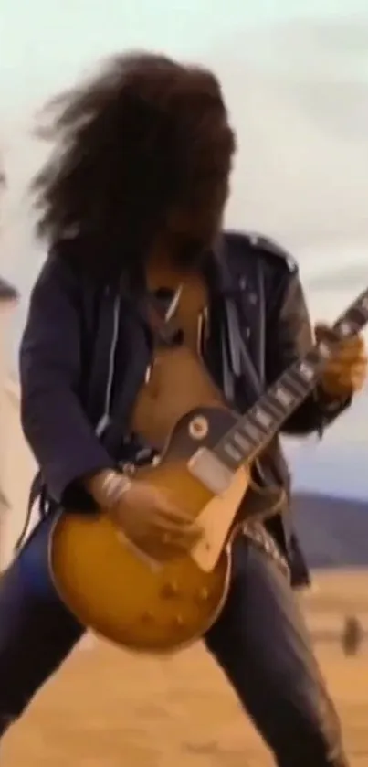 Guitarist passionately playing in an open field with a church in the background.