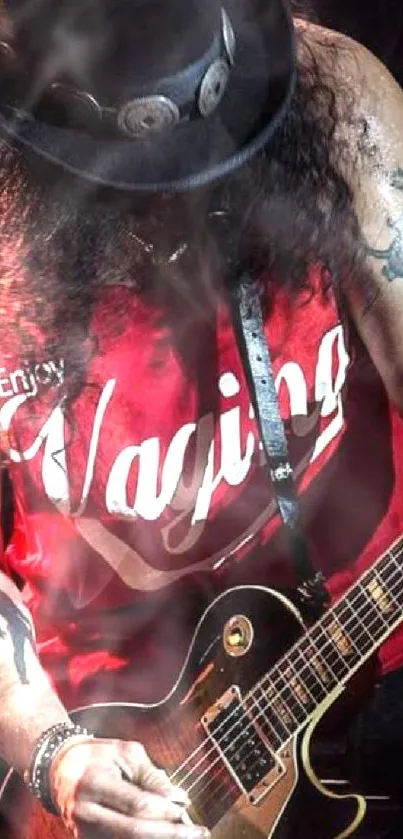 Vibrant rock guitarist in red tank top playing electric guitar on stage.