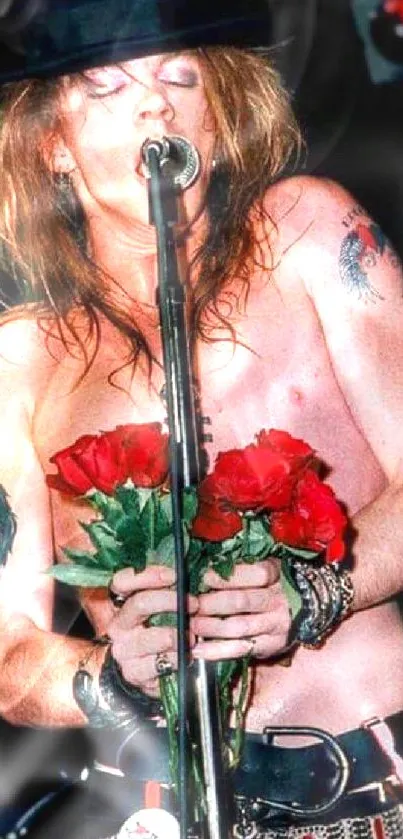 Rock star singing with red roses and a microphone on stage.