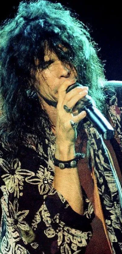 Rock star passionately performing on stage with microphone.