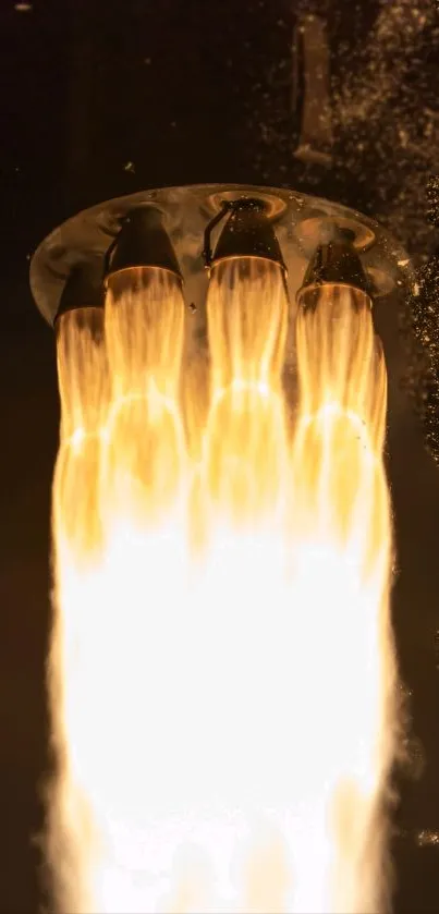 Fiery rocket engine flame shooting downwards with dark background.