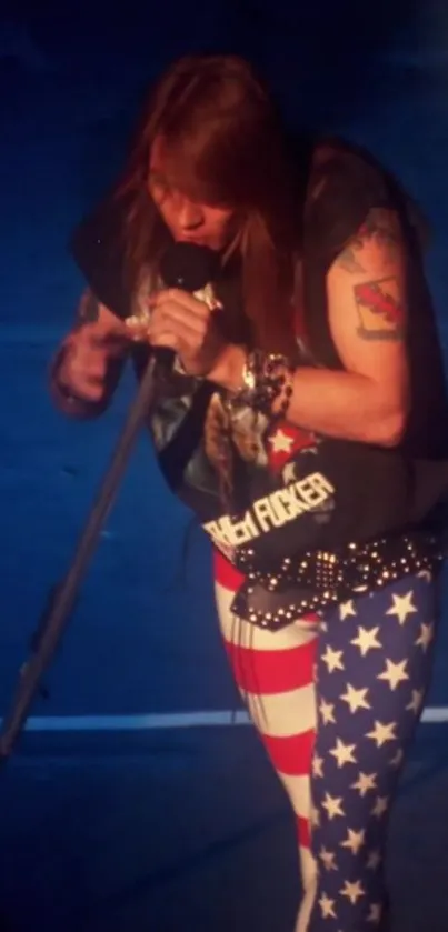 Rockstar performing live with star-spangled attire on stage.