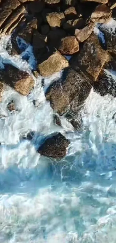 Aerial view of rocky coastline with waves crashing.